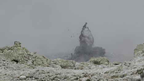 Boiling-hot-geothermal-volcanic-mud-pool,-closeup-shot-steamy-lake-bubbling-mud-and-steam-satisfying