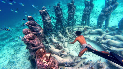 underwater view of the bask nest sculptures in bali, indonesia