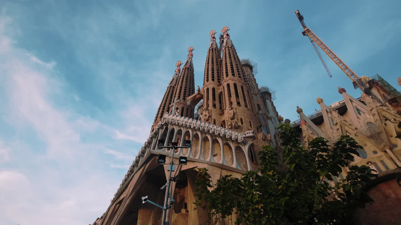 Low angle exterior establishing shot of La Sagrada Familia
