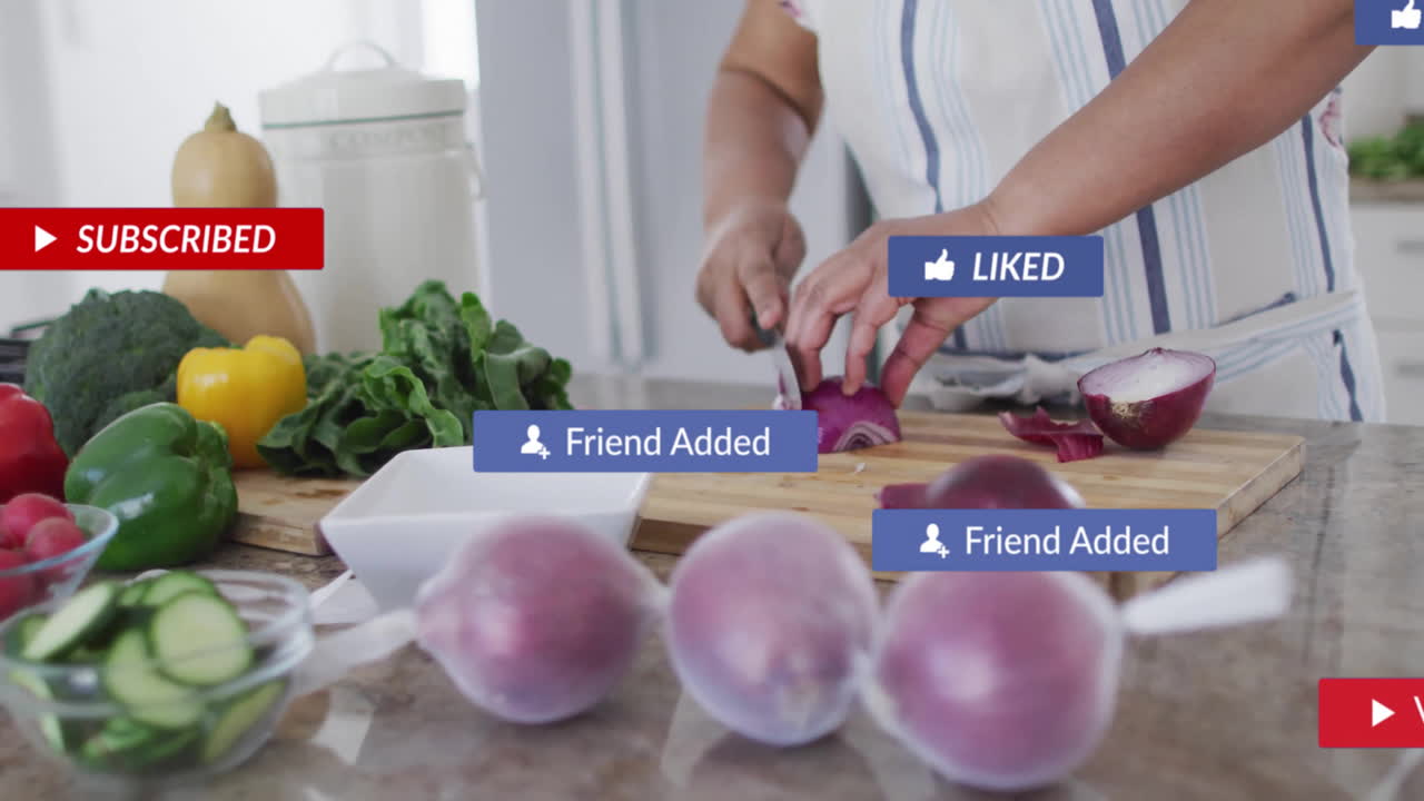 Chopping onions in kitchen, person receiving social media notifications animation