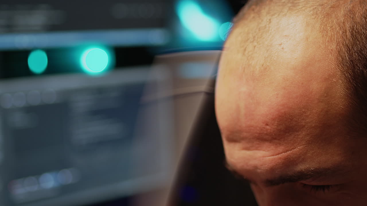 A close-up of a person working on a computer