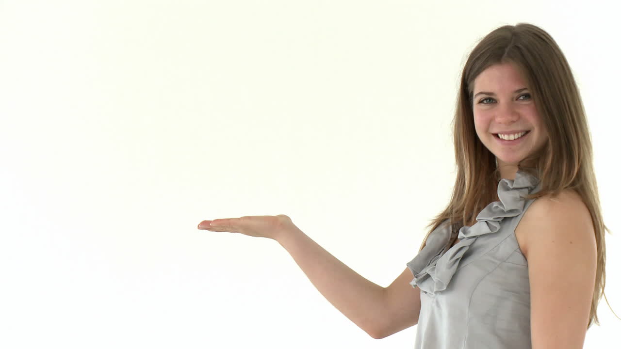 cute woman presenting a product