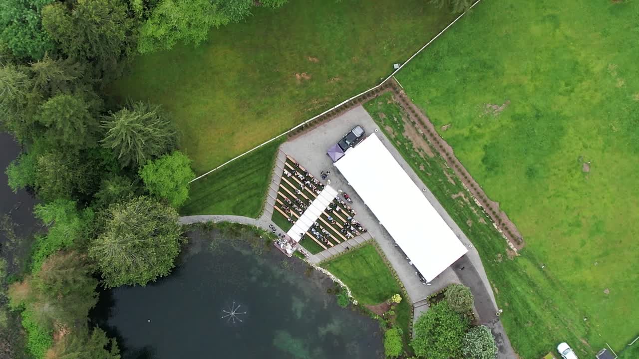 Aerial view from drone of a farm with a lake