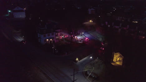 night aerial shot of ambulance and police cars