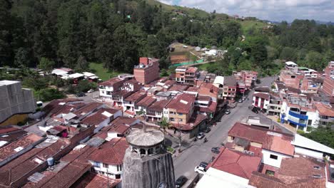 Aerial-View-Of-Nuestra-Senora-De-Chiquinquira-Church-In-Downtown-El-Penol,-Antiquoia,-Colombia