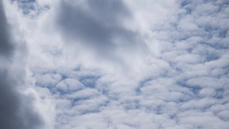 daytime cloud time lapse with two layers moving in opposite directions