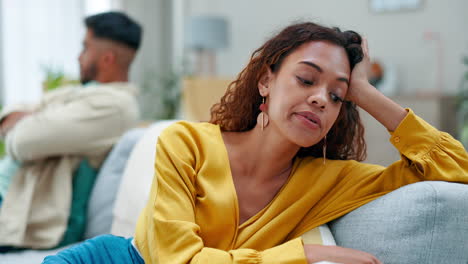 stress, argument and depressed couple on sofa