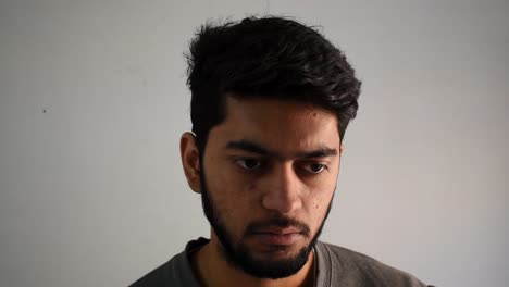 portrait serious male face expression thinking of something serious, serious facial expression man taking off glasses feeling scared under confident, feeling unhappy