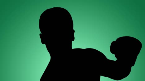 Animation-of-silhouette-of-male-boxer-in-action-on-green-background