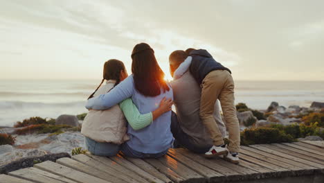 parents, kids and back at beach