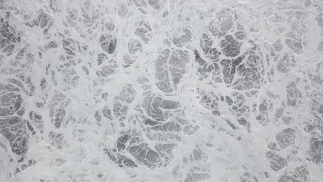 scenic view of sea with foamy waves