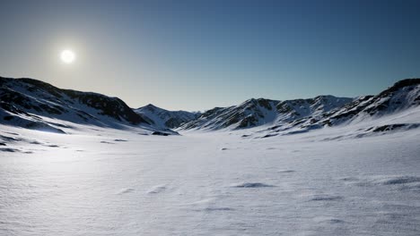 Aerial-Landscape-of-snowy-mountains-and-icy-shores-in-Antarctica