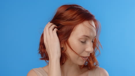 woman with red hair, studio portrait
