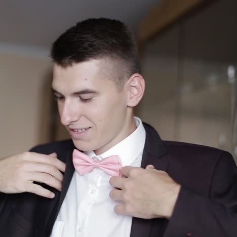 elegant groom in wedding jacket