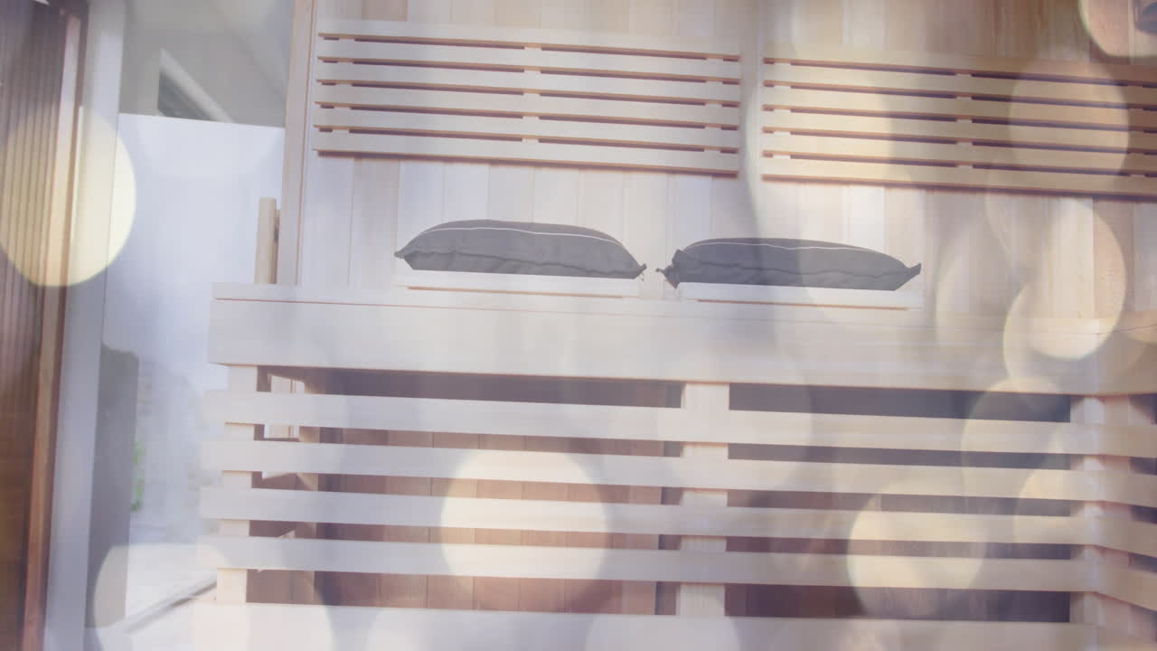 장식적인 베개와 함께 현대적인 목조 인테리어에 대한 가운 보케 애니메이션