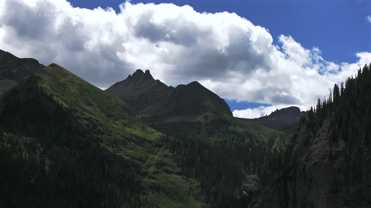 Yankee Boy Basin 4wd hiking bluesky cliffside valley aerial drone upward motion Ouray Ridgway stunning summer Telluride Colorado Box Canyon Black Bear Pass Road Bridal Veil Falls Aspen Forest