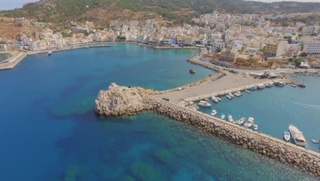 aerial: view of the harbour and city of karpathos