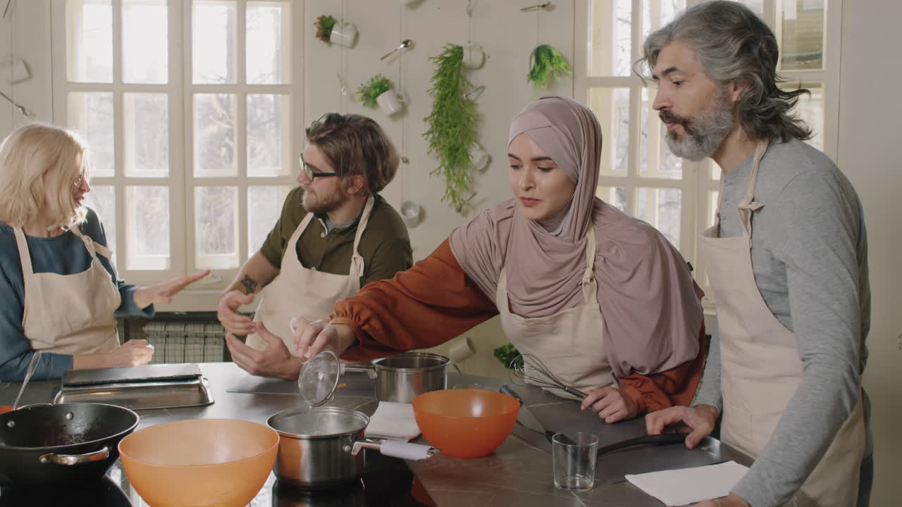 Diverse People Cooking At Culinary Class