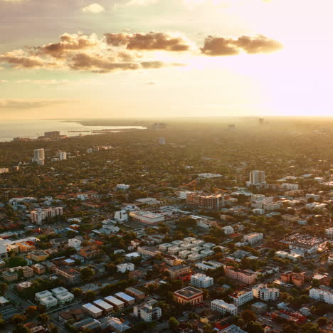 immense scenery of sunny city on the shore of the atlantic ocean. sunset view of miami, florida, usa from top.