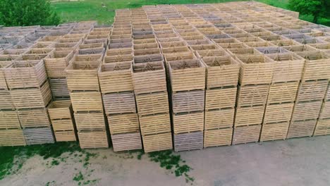 folded empty wooden boxes in warehouses, boxes are designed for harvesting fruits and vegetables