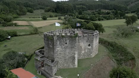 flags flying at castillo de moeche, san xurxo de moeche, a coruña, spain