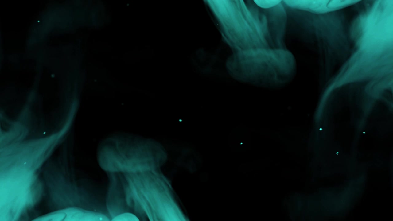 Elegant Wisps of Blue Smoke and Particles Against Black Background