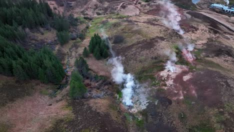 Drone-Shot-Of-Steaming-Hot-Springs-Next-To-Hveragerdi-Town-In-South-Iceland