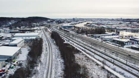 snow-covered european route e45 just outside gothenburg, aerial view of winter traffic