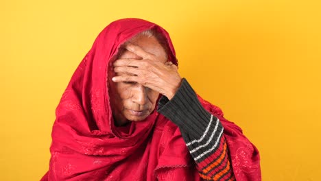 Senior-asian-women-suffering-headache,