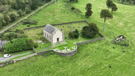 aerial circling old church and cemetery in waterford ireland on a dull day