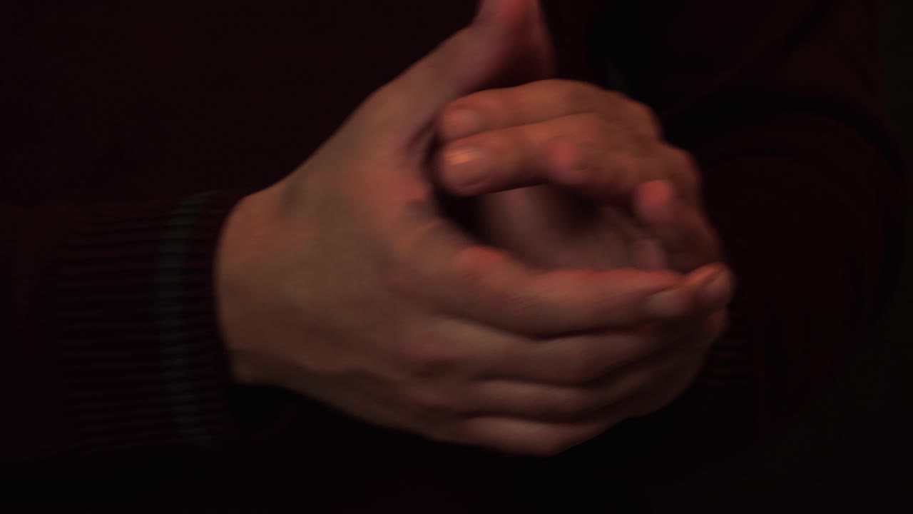 A close-up of hands clapping, symbolizing applause and appreciation. Perfect for illustrating gestures of approval, recognition, encouragement, and social interaction.