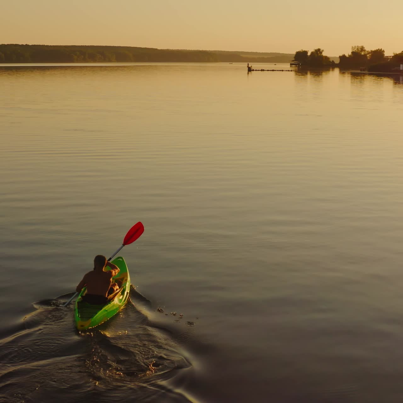 Man floating in boat on vacation. Swimming on kayak boat. Fitness workout with oars. Water tourism. Exploring river in boat. Video