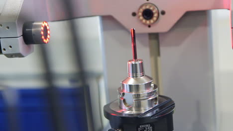 Quality-control-of-machine-part.-Laser-processing-of-metal-part.-Laser-rays