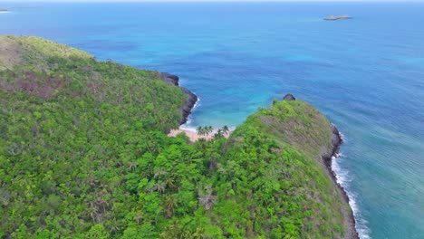 small hidden sand beach paradise in the atlantic ocean, aerial orbit summer day