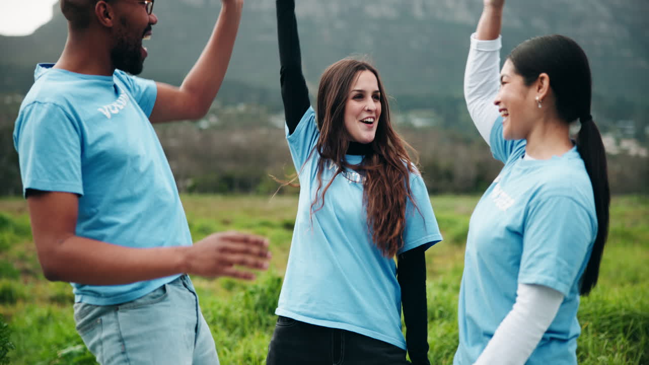 Volunteers Celebrating Together Outdoors