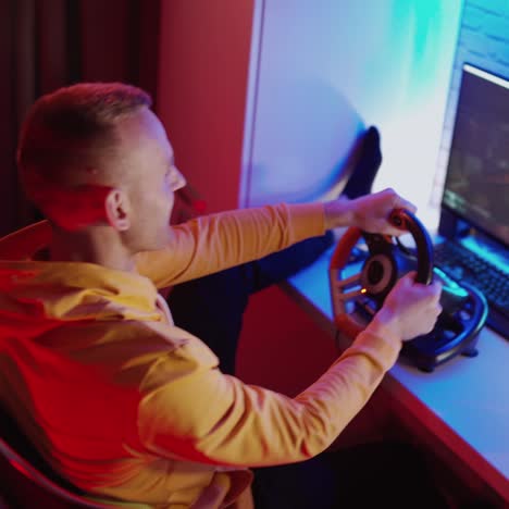 man paying car simulator