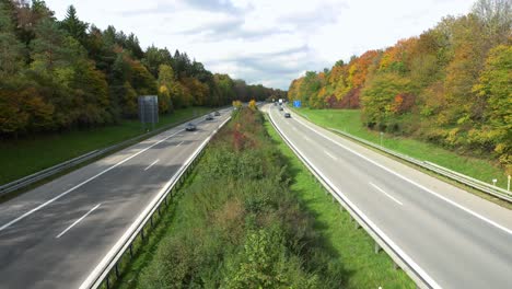 timelapse of fast driving cars over a german autobahn, traffic at the freeway in speed motion