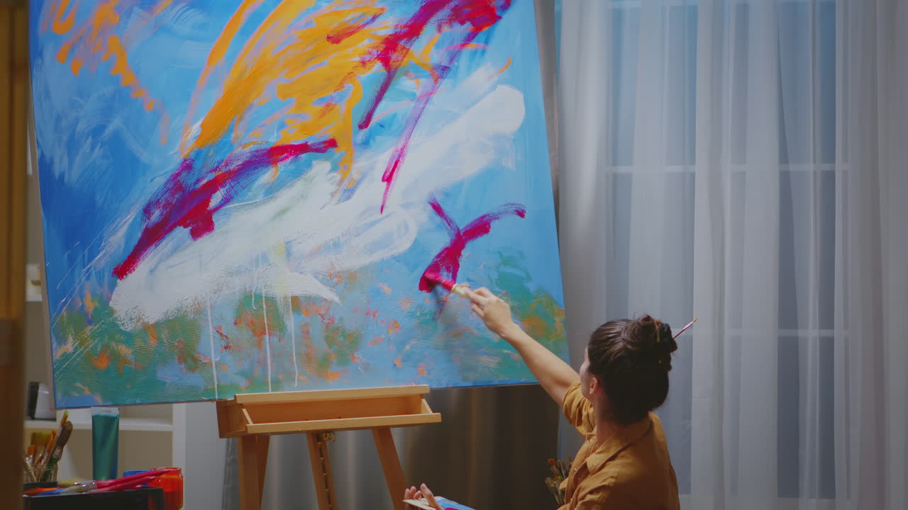 Artist working in her studio