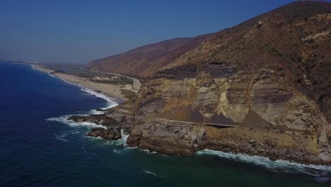 point mugu rock - pacific coast highway. ascending sliding shot, left.