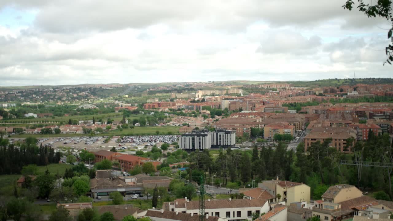 SLOW MOTION SHOT OF THE MODERN PART OF TOLEDO CITY
