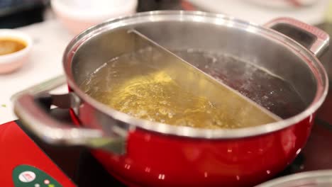 soup boiling in a divided hotpot