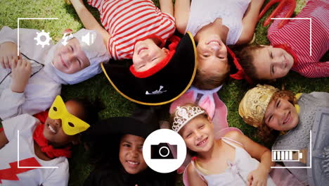 tomar fotos de niños con trajes de moda en una cámara digital