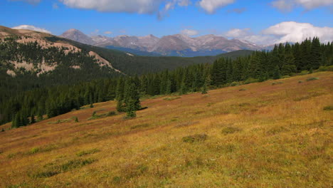 colorful colorado cinematic aerial drone summer boreas pass breckenridge summit county windy green grass dramatic incredible landscape rocky mountain peaks daylight forward reveal up motion