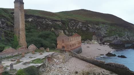 porth wen reversing aerial view abandoned victorian industrial brickwork factory remains on anglesey eroded coastline