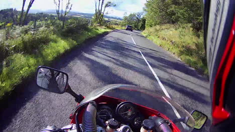 motorcycle tour in glencoe scotland highlands hills and trees on a helmet mounted action camera