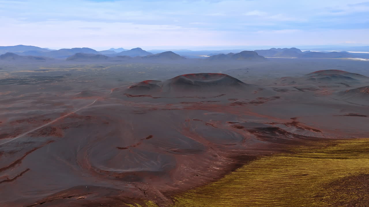 Flying above the unrealistic cosmic landscape with sleeping volcano craters. Extraterrestrial scenery of Iceland from drone.