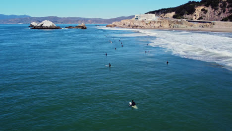 san francisco ocean beach surfing spot with surfers in california, usa