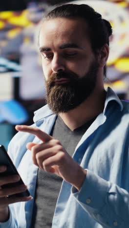vertical video young relaxed adult connecting on a social network in the digital world