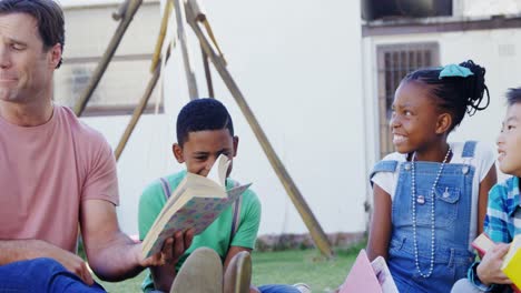 man teaching kids in the backyard of house 4k