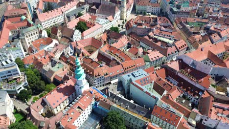 aerial view of bratislava castle and old town during the day, drone aerial view 4k establishing shot of the slovakian european capital city during the summer, stunning view of the landmark